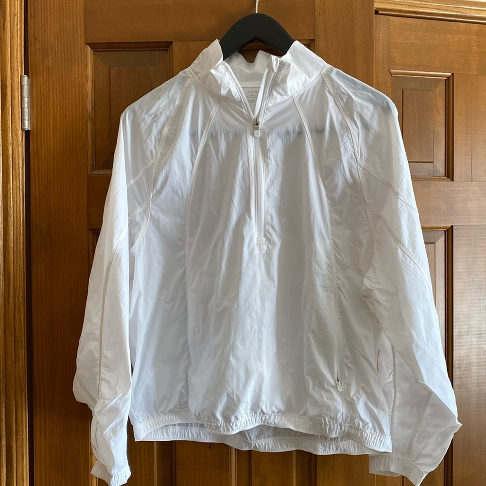 White Athleta windbreaker in good condition. (M)
